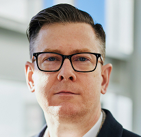 Kripto alım satım şirketi yöneticisi Alexander Hughes CEO portresi